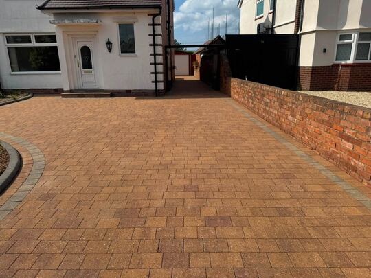 After: block-paved driveway